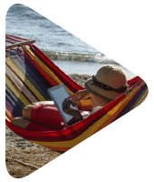 Child in a hammock on a beach